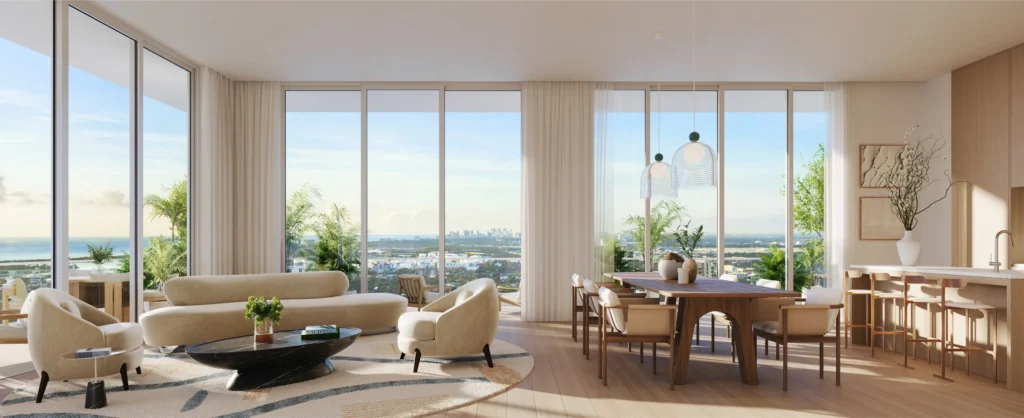 interior living room lined with floor to ceiling windows alongside kitchen and eating area at Viceroy Residences Fort Lauderdale